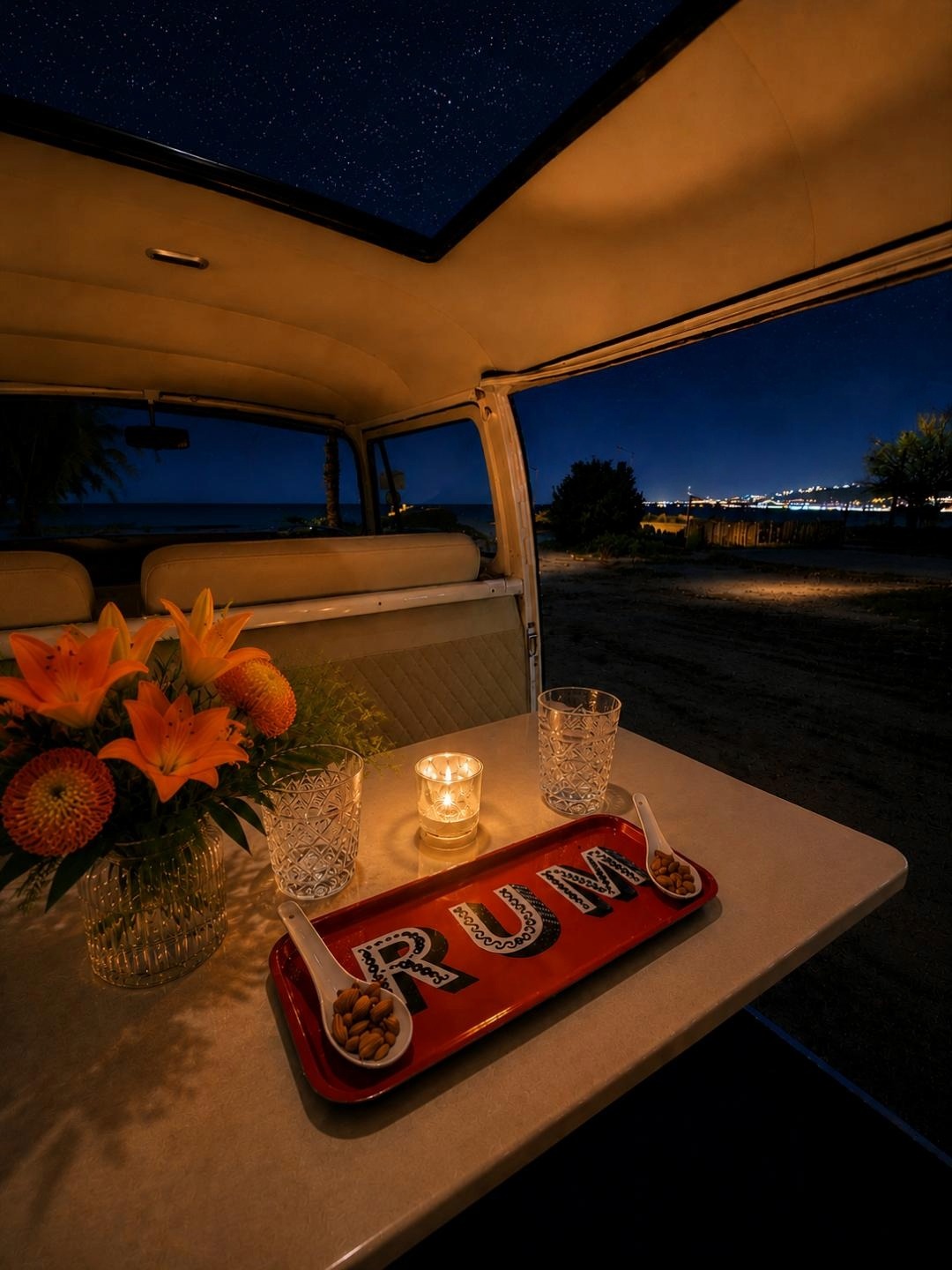 A candlelit table inside The Curists van at night